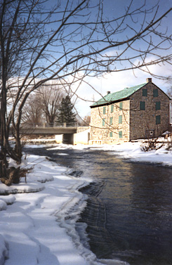 Martintown Mill with Raisin River partially frozen over